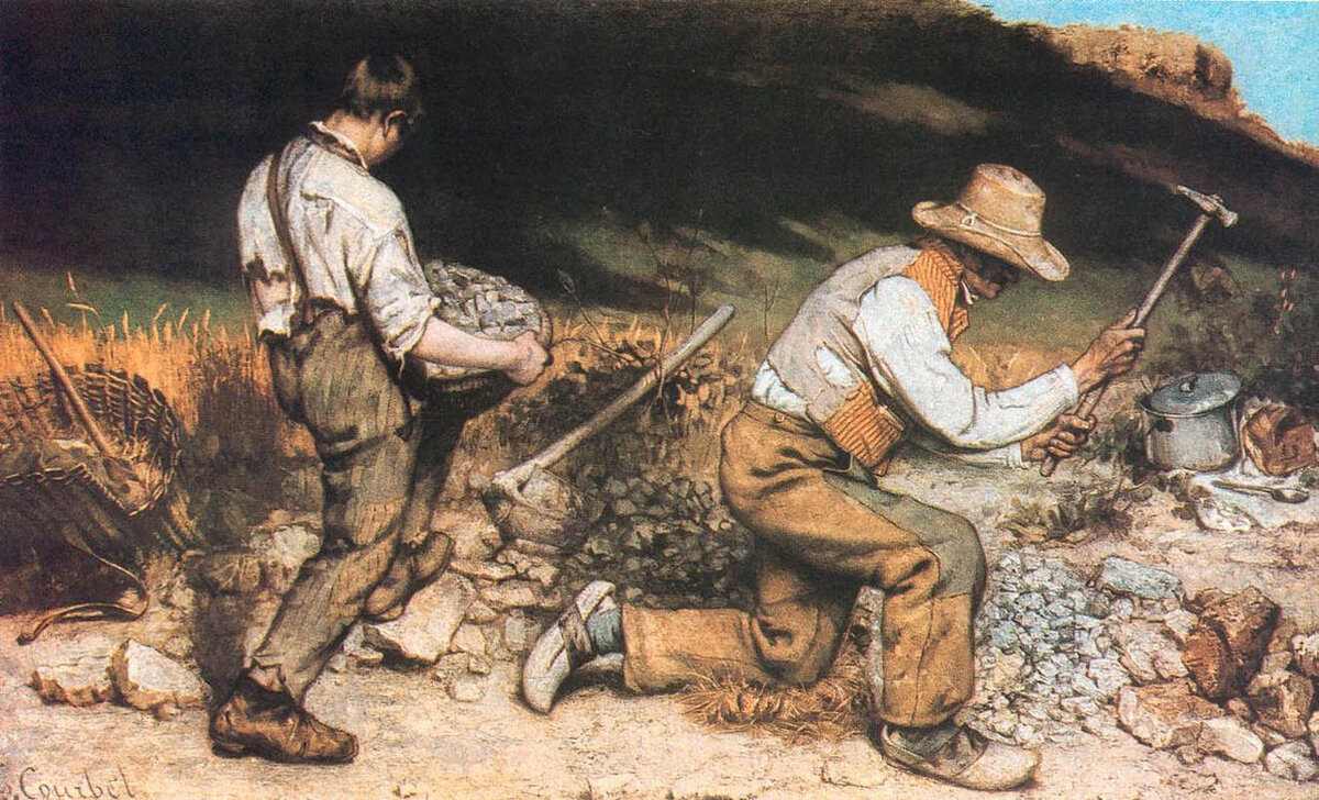 Two labourers breaking stones by the roadside, bent under the weight of work that serves someone else's road